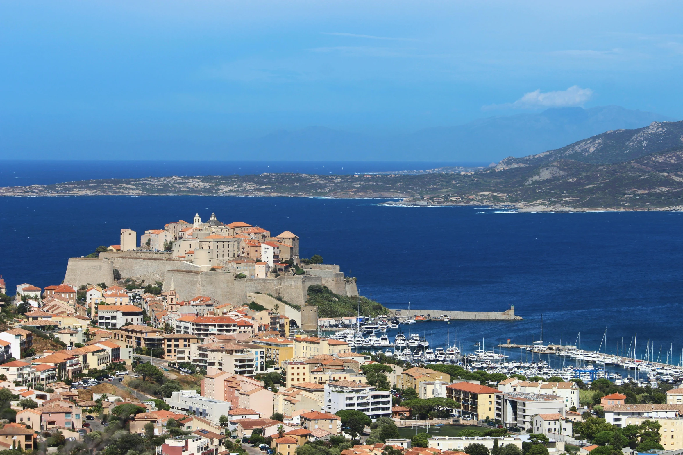 a city sitting on top of a hill next to the ocean, pexels contest winner, renaissance, traditional corsican, square, 8 k -, clear and sunny