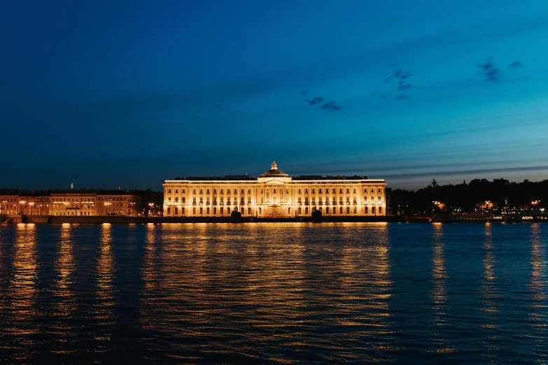 a large building sitting on top of a body of water, by Alexey Venetsianov, pexels contest winner, neoclassicism, warm summer nights, nobel prize, wikimedia commons, shot on hasselblad