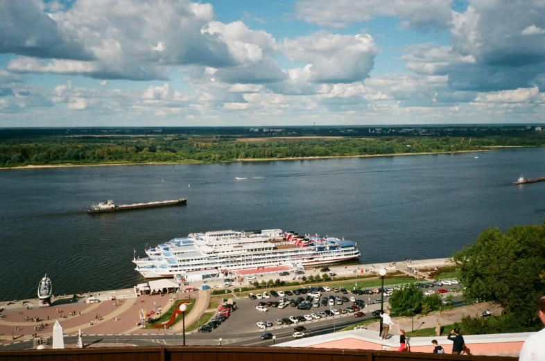 a view of a cruise ship from the top of a building, a portrait, happening, tula, 000 — википедия, wide river and lake, 2022 photograph