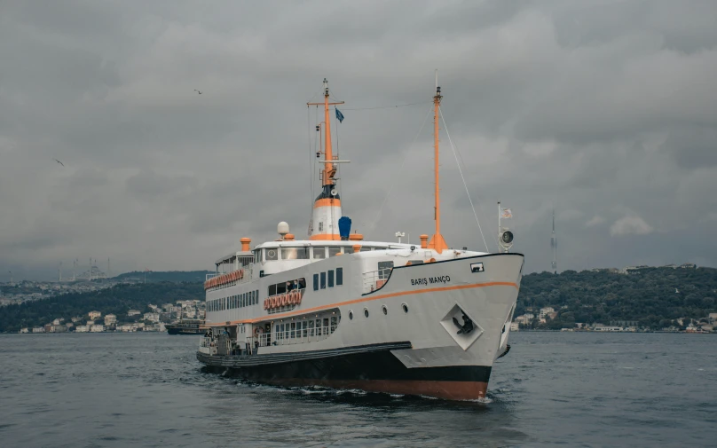 a large white boat floating on top of a body of water, istanbul, orange grey white, sea queen, thumbnail