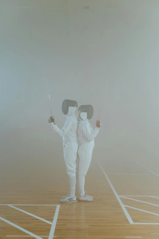 a couple of people standing on top of a wooden floor, by Attila Meszlenyi, conceptual art, fencing, white fog, daft punk, the olympics footage