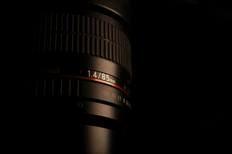 a close up of a camera lens in the dark, by Daniel Seghers, unsplash, photorealism, taken with canon 5d mk4, 14mm lens, 1 3 5 mm!!, 4 5 mm. photorealistic