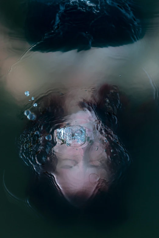 a close up of a person swimming in a pool, inspired by Elsa Bleda, surrealism, barreleye, ignant, iceland, surrealism 8k