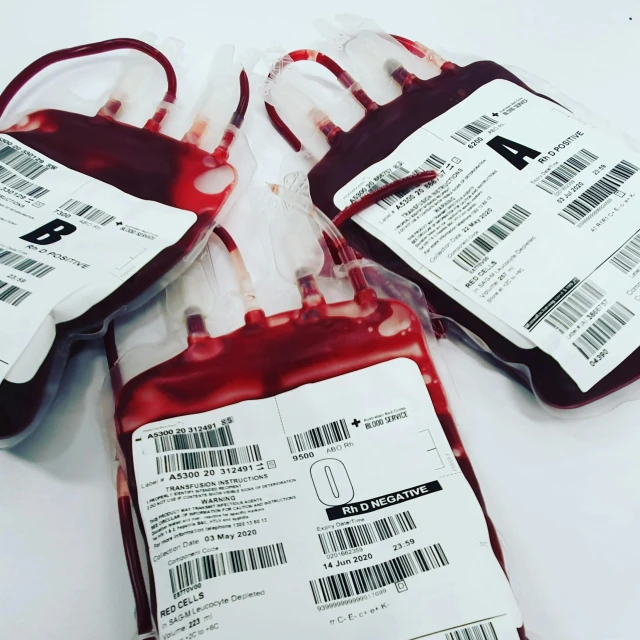 a group of blood bags sitting on top of a table