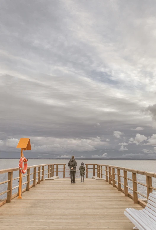 a couple of benches sitting on top of a wooden pier, a picture, by Eglon van der Neer, unsplash, conceptual art, big clouds, walking towards camera, fisherman, brown