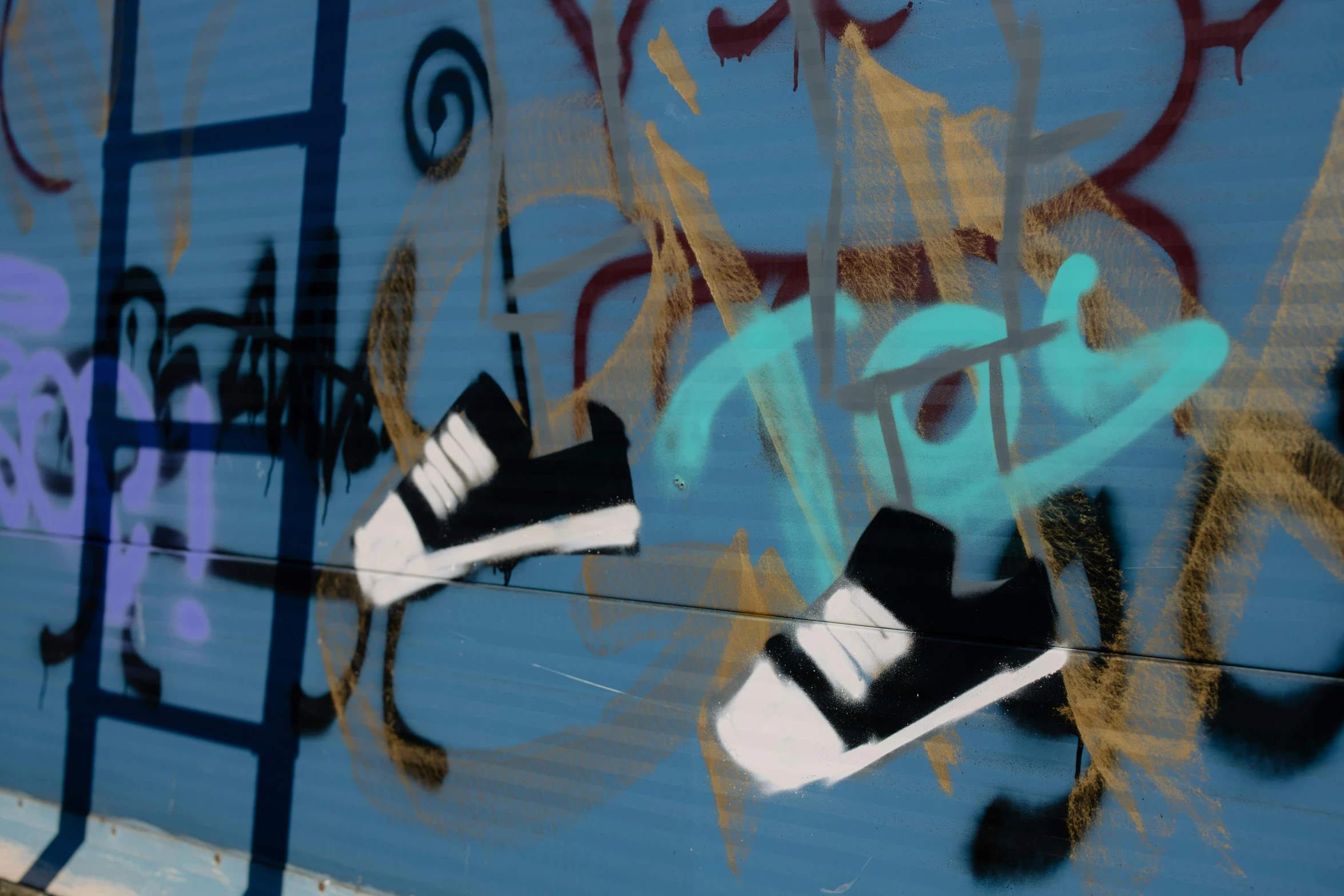 a wall that has some graffiti on it, unsplash, graffiti, blue shoes, adidas painting, ultra detail. digital painting, thumbnail