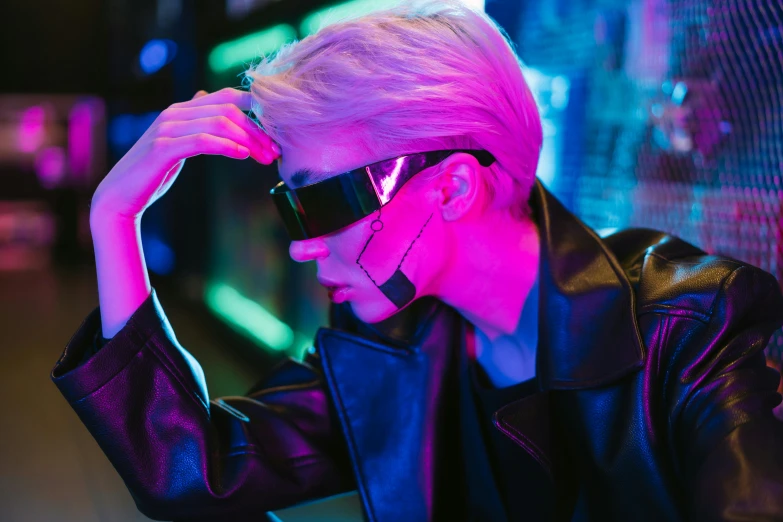 a woman in a black leather jacket and sunglasses, cyberpunk art, inspired by Liam Wong, trending on pexels, holography, cai xukun, neon aesthetic, xqc, cyborg fashion shot