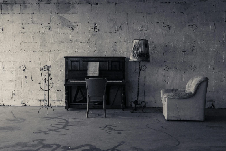 a black and white photo of a living room, an album cover, by Lucia Peka, pexels contest winner, conceptual art, dilapidated, background image, full piano, horror wallpaper aesthetic