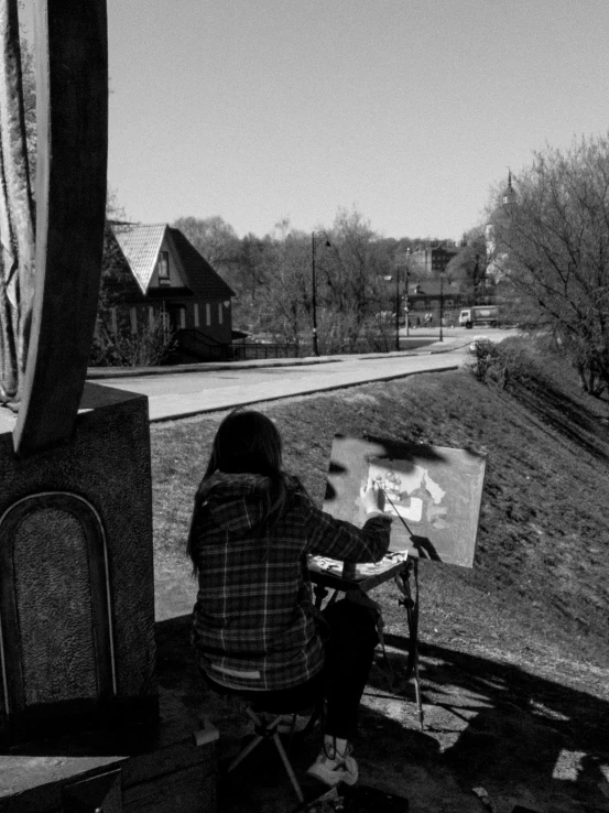 a black and white photo of a woman painting, a charcoal drawing, inspired by Vasily Perov, beautiful view, street photograph, myself, landscape photo-reality