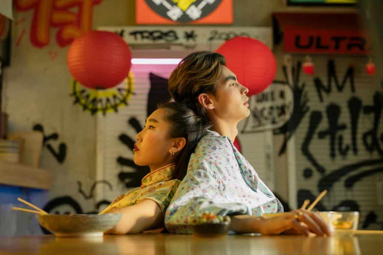 a couple of women sitting at a table with chopsticks, trending on pexels, hyperrealism, 8 0 s asian neon movie still, beautiful boy, yukata clothing, of taiwanese girl with tattoos