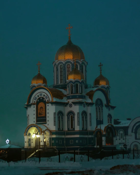 a church lit up at night in the snow, an album cover, by Andrei Kolkoutine, unsplash contest winner, 000 — википедия, russian city, with a black dark background, square