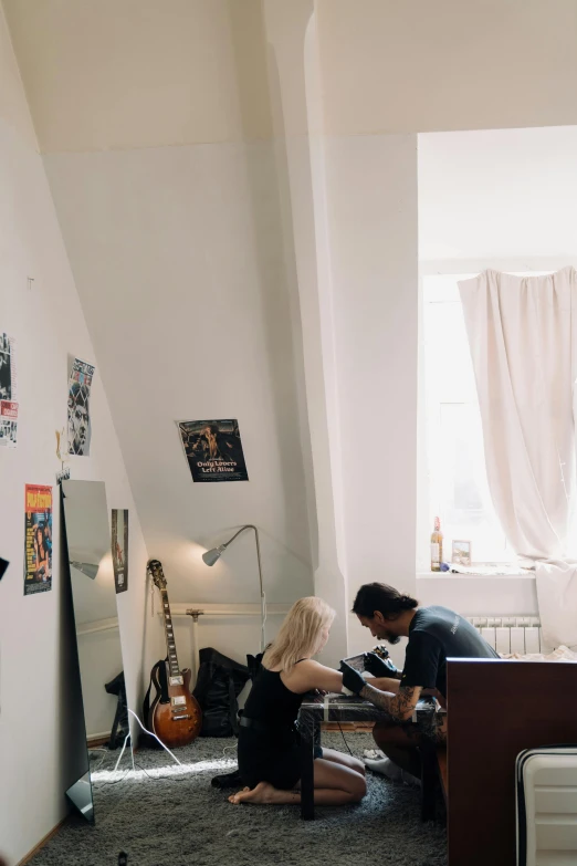 a couple of people that are sitting in a room, pexels contest winner, arbeitsrat für kunst, small and cosy student bedroom, tattooed, kreuzberg, 15081959 21121991 01012000 4k