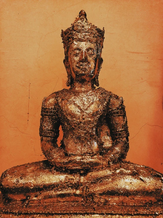 a statue of a person sitting in a lotus position, arte povera, shades of aerochrome gold, 1 4 8 0 s, glittering, thai