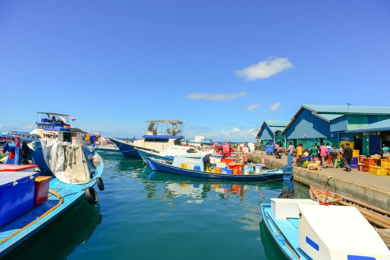 a bunch of boats that are in the water, pexels contest winner, hurufiyya, avatar image, aruba, market setting, 2045