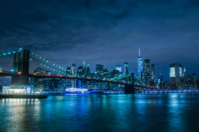 a view of the brooklyn bridge at night, pexels contest winner, teal lights, panoramic photography, fan favorite, ultra hd wallpaper