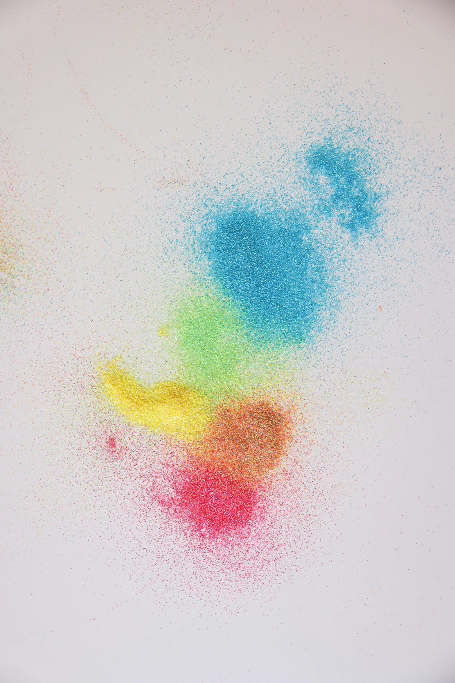 a white plate with colored sprinkles on it, a pointillism painting, trending on pexels, kinetic pointillism, flour dust spray, blowing sands, colorful computer screen, puffs of colored smoke