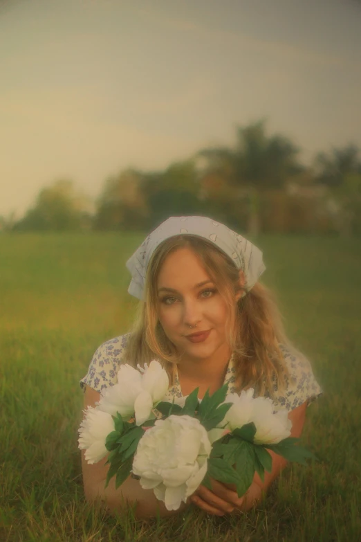 a woman sitting in a field holding a bouquet of flowers, a colorized photo, music video, wearing a white bathing cap, portrait shot 8 k, pokimane