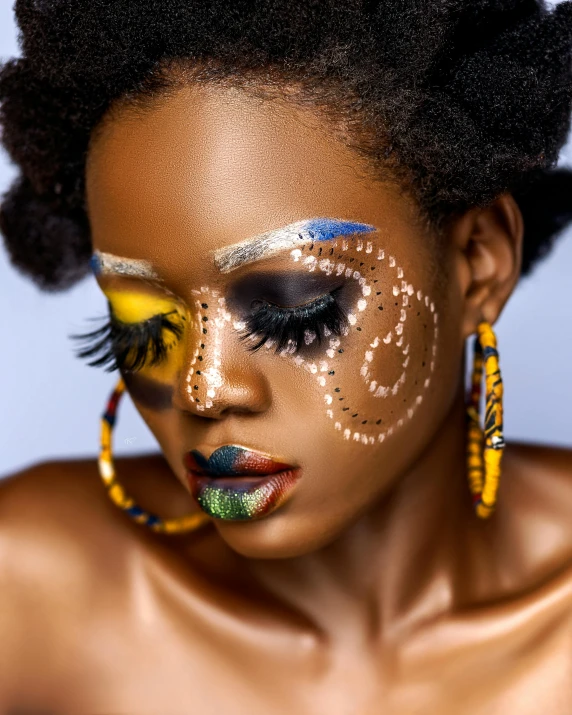 a woman with gold paint on her face, trending on pexels, afrofuturism, eyes are rainbow spirals, lashes, full body image, black jewelry