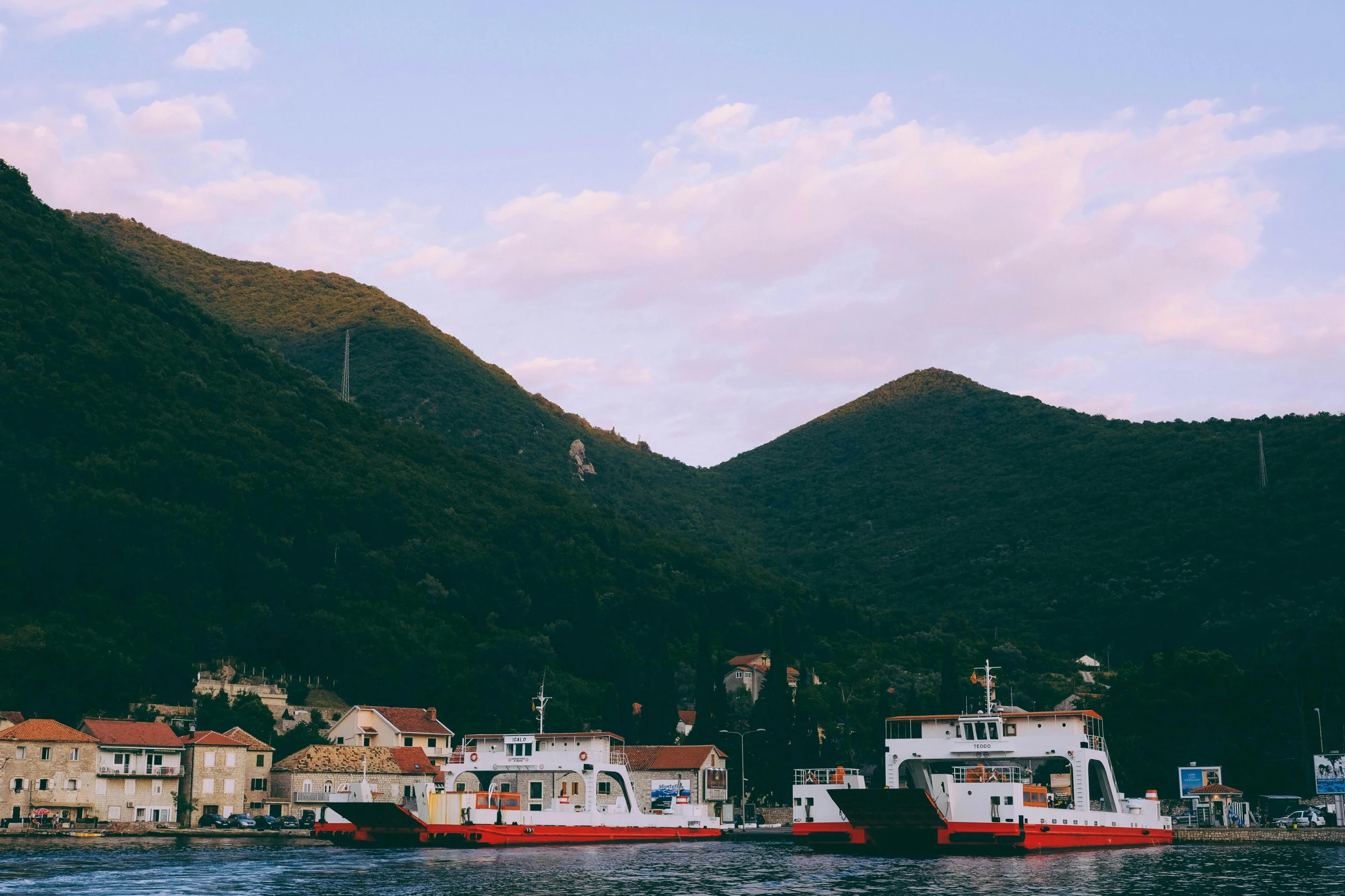 a couple of boats that are in the water, pexels contest winner, modernism, boka, moody : : wes anderson, 🦩🪐🐞👩🏻🦳, beautiful small town