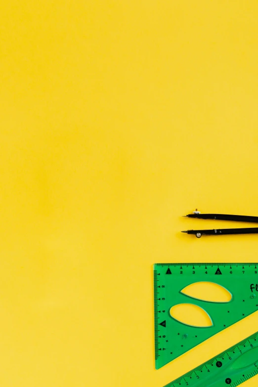 a pair of scissors and a ruler on a yellow background, trending on unsplash, visual art, photo of a classroom, promo image, geometrical drawings, square