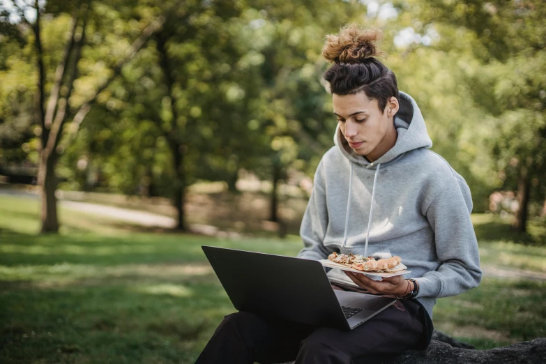 a man sitting on a rock using a laptop, trending on pexels, realism, people outside eating meals, sydney park, girl wearing hoodie, avatar image