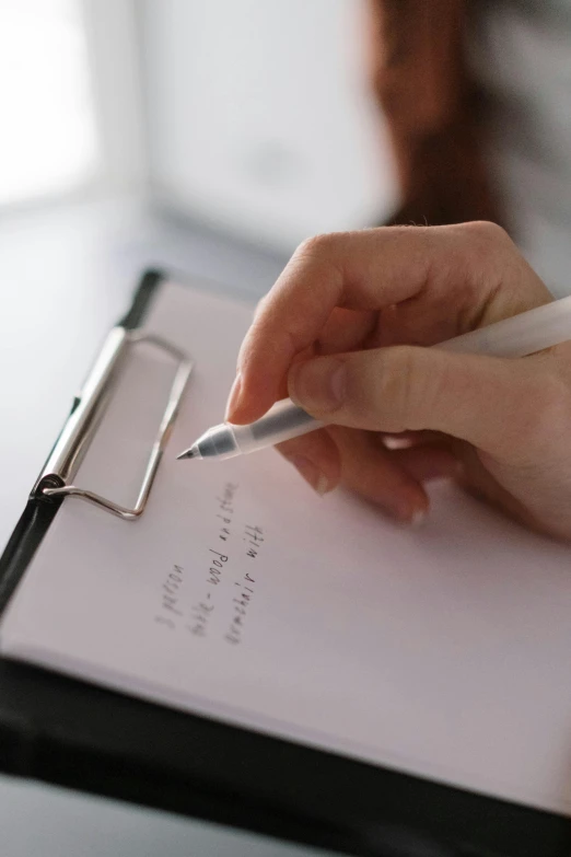a person writing on a clipboard with a pen, royal commission, thumbnail, soft light, uploaded