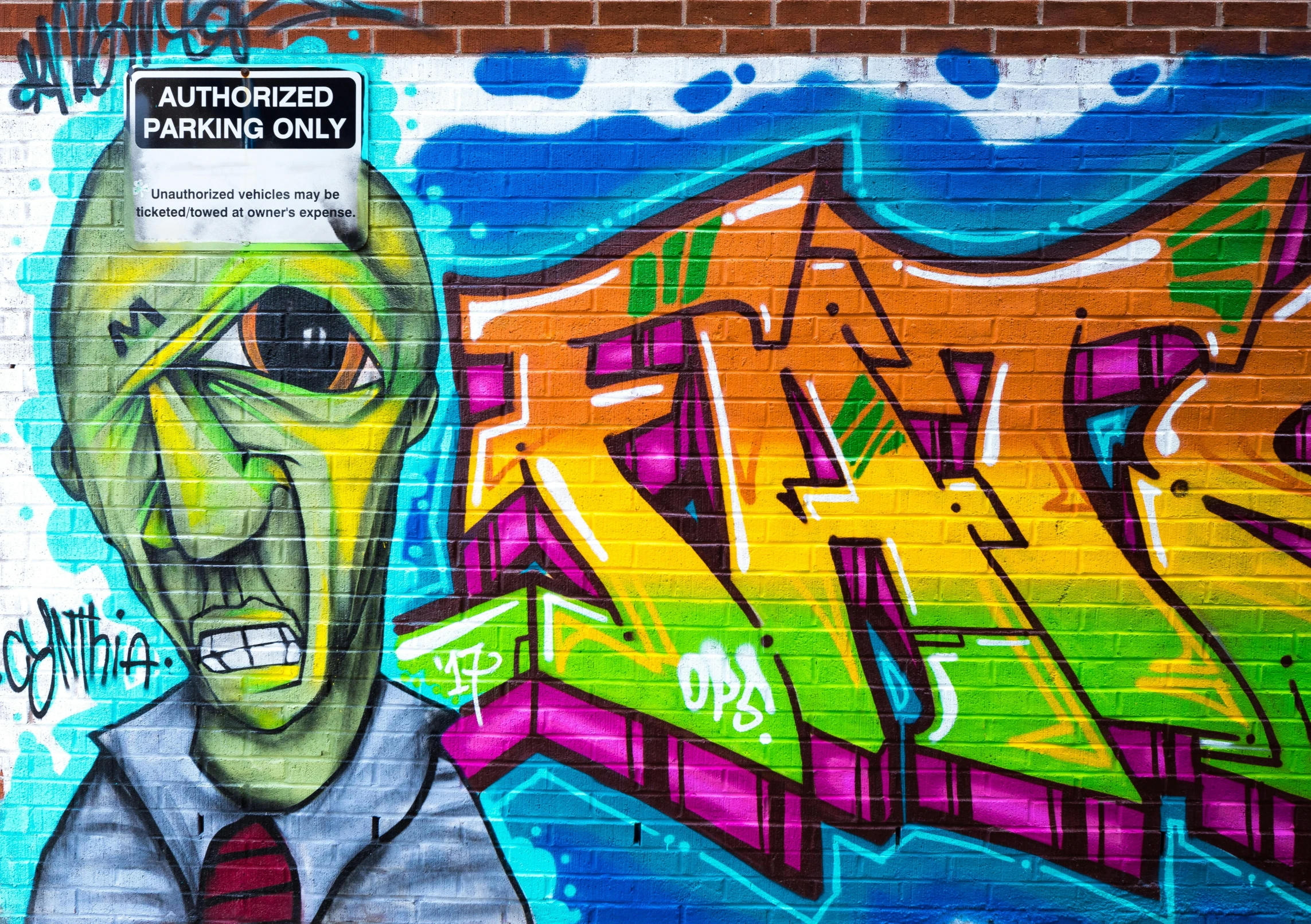 a man in a suit and tie standing in front of a graffiti wall, graffiti art, by Jaime Jones, pexels, art alien, painted on a brick wall, fined detail, vibrant cartoon art