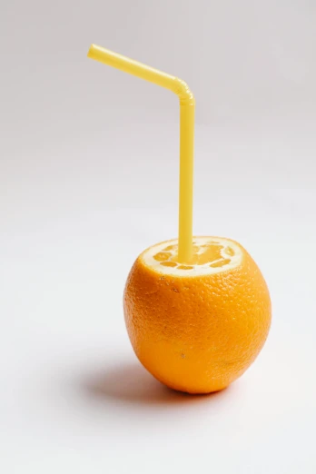 an orange with a straw sticking out of it, product display photograph, profile image, made of food, mind - bending