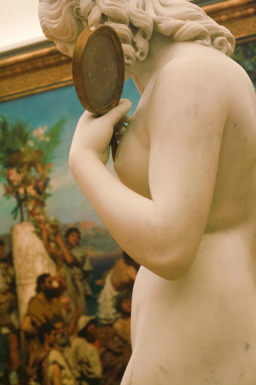 a statue of a woman holding a mirror, inspired by Théodore Chassériau, mannerism, over-the-shoulder shot, demna gvasalia, shapely derriere, cinematic still