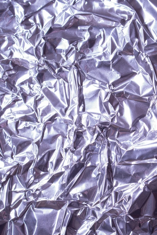 a close up of a sheet of tin foil, pexels, ((purple)), award - winning crisp details, silver iodide, y2k”
