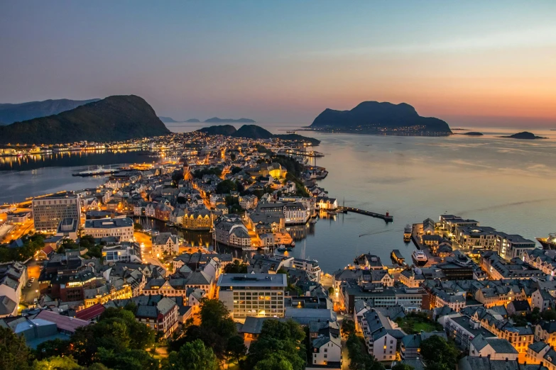 a view of a town from the top of a hill, by Ejnar Nielsen, pexels contest winner, art nouveau, victorian harbour night, summer morning light, fjords, 8k resolution”