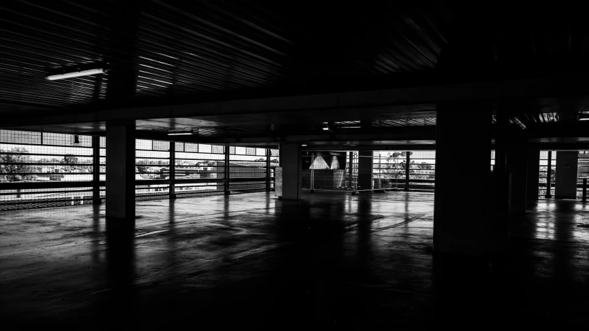 a black and white photo of a train station, light and space, set inside of parking garage, dark dance photography aesthetic, shot on iphone 6, today\'s featured photograph 4k