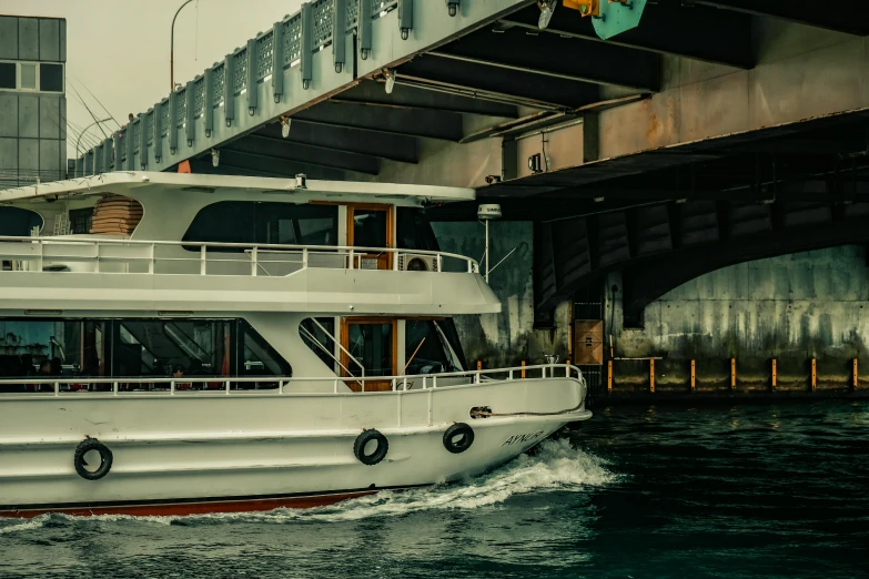 a large white boat traveling under a bridge, by Julia Pishtar, pexels contest winner, hurufiyya, hyper realistic, on a super yacht, vintage color, a cozy
