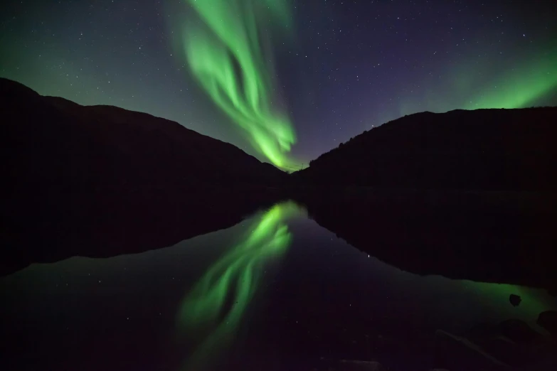 a large body of water with aurora lights in the sky, by Anato Finnstark, hurufiyya, fire reflection, 4k), lynn skordal, fjord