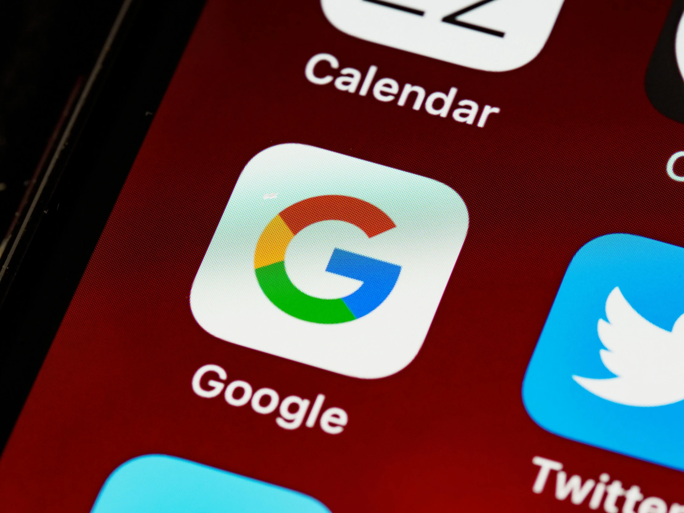 a close up of a cell phone with various apps on it, by Carey Morris, pexels, google logo, year 2 0 2 2, photograph credit: ap, ios app icon