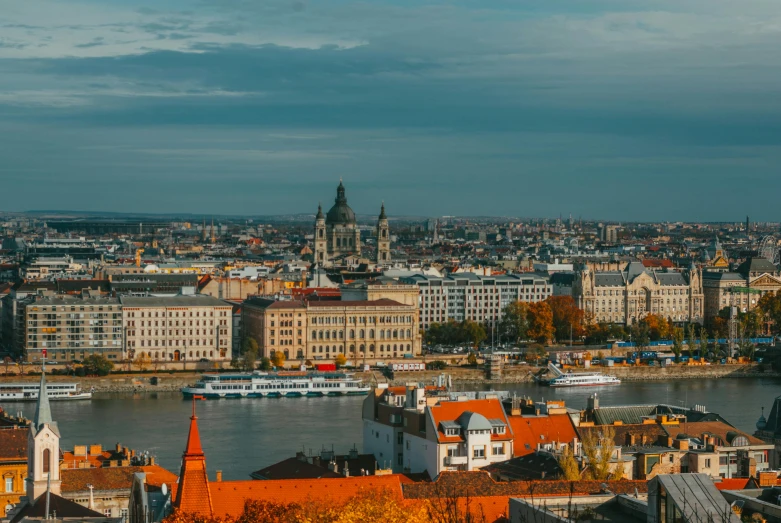 a view of a city from the top of a hill, by Adam Szentpétery, pexels contest winner, art nouveau, budapest, river in the background, square, high quality photo