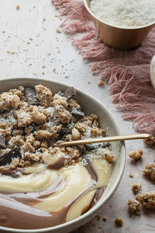 a close up of a bowl of food on a table, by Daniel Seghers, creamy, thumbnail, desserts, taupe