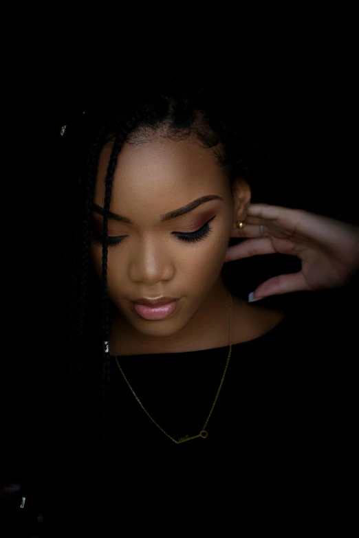 a close up of a person with a cell phone, an album cover, inspired by Theo Constanté, trending on pexels, dark light night braided hair, teenage girl, portrait pose, black jewerly