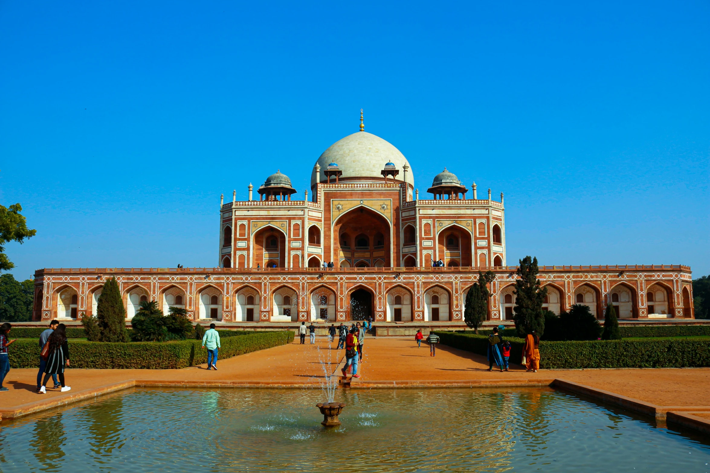 a large building with a fountain in front of it, tomb, india, fan favorite, geodesic domes