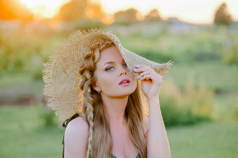 a beautiful young woman wearing a straw hat, by Julia Pishtar, pexels contest winner, renaissance, pigtails hairstyle, soft sunset lighting, anna nikonova aka newmilky, vine headdress