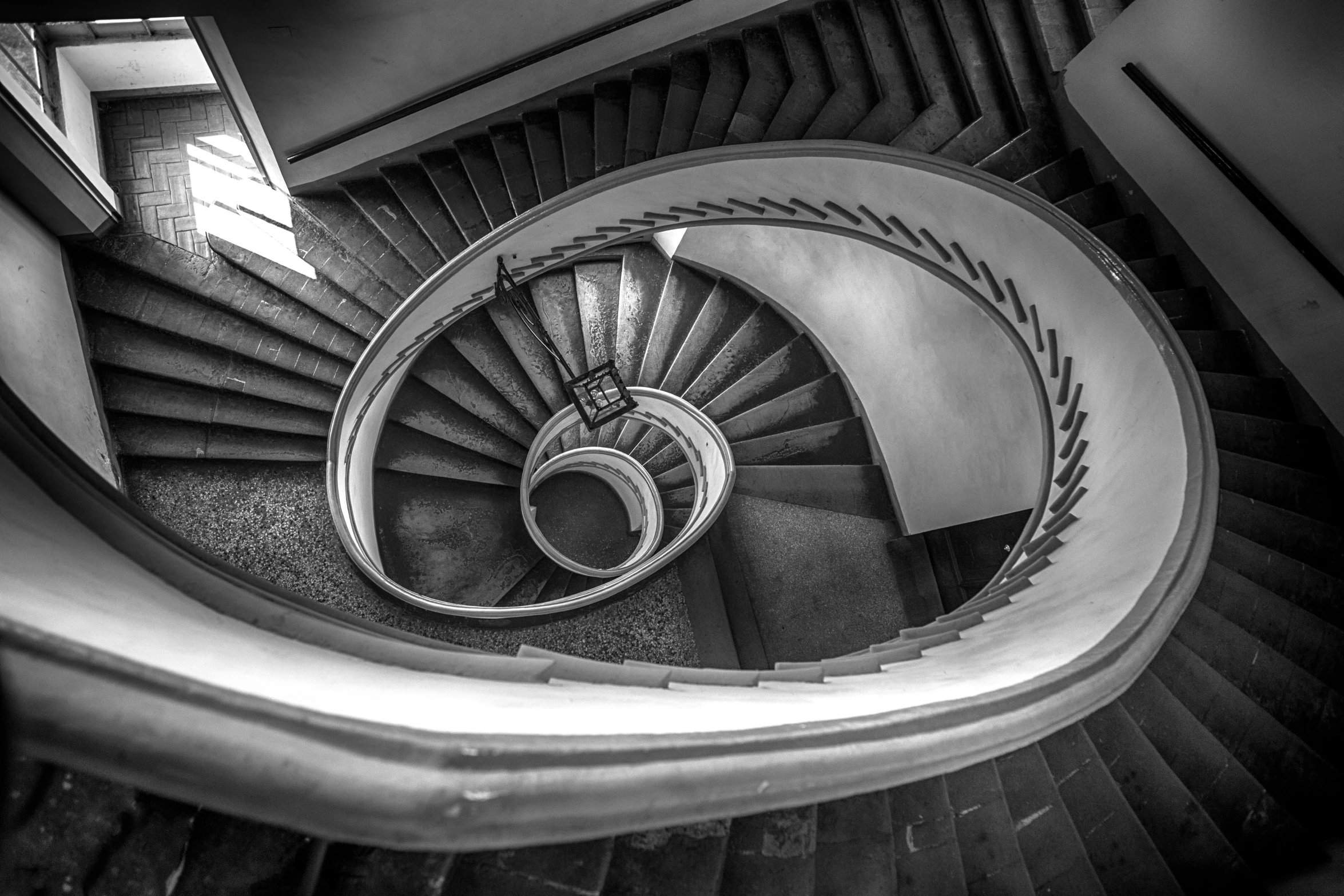 a black and white photo of a spiral staircase, by Sven Erixson, mixed art, panzer, b & w detailed sharp photo, whirlpool