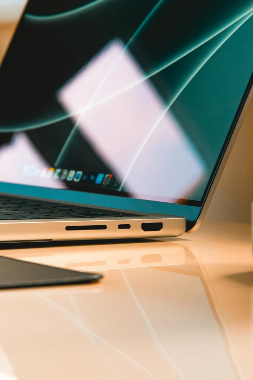 a laptop computer sitting on top of a desk, pexels, superb detail 8 k, thumbnail, rounded lines, portrait shot