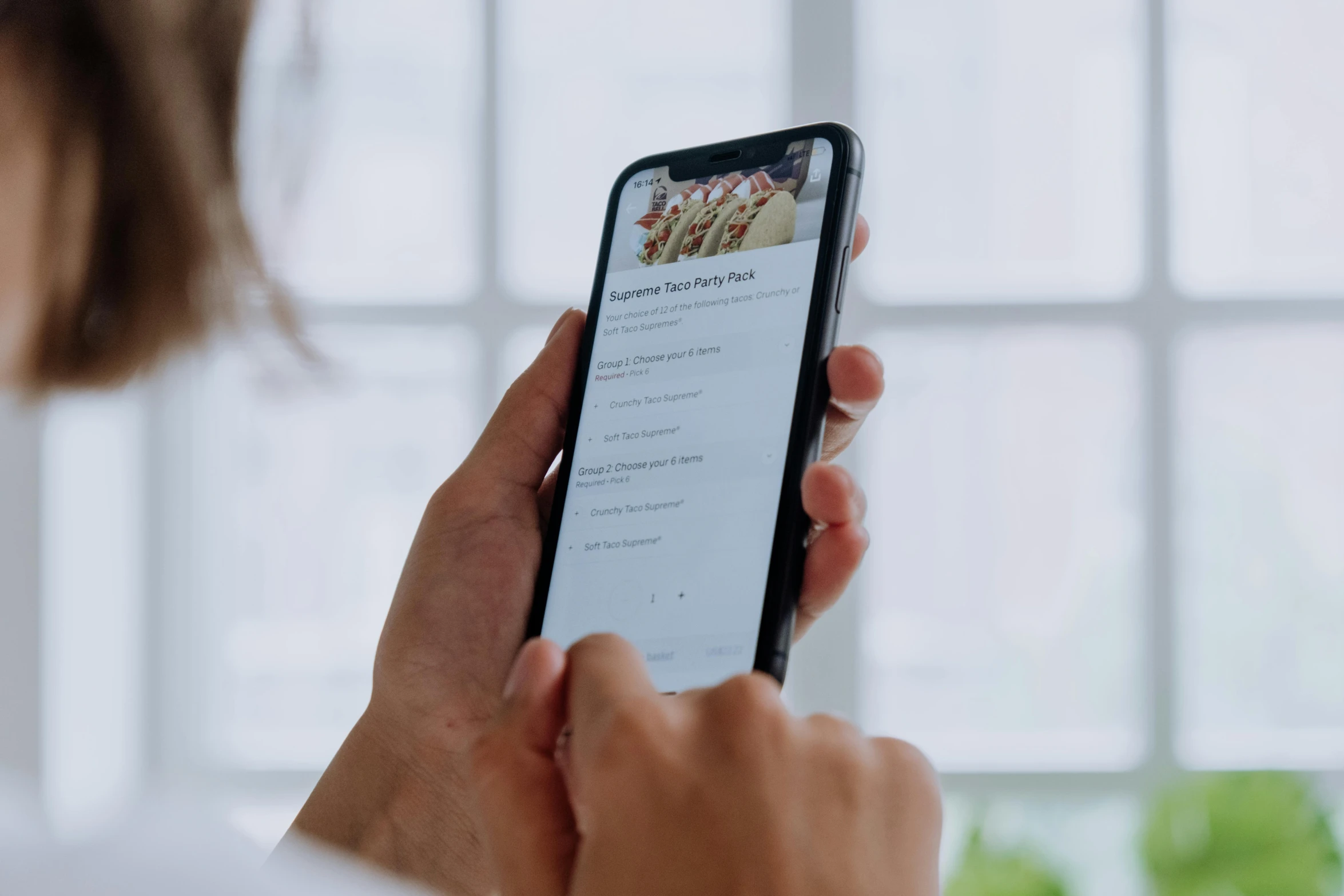 a close up of a person holding a cell phone, a picture, recipe, detailed product image, profile image, viewed from very far away