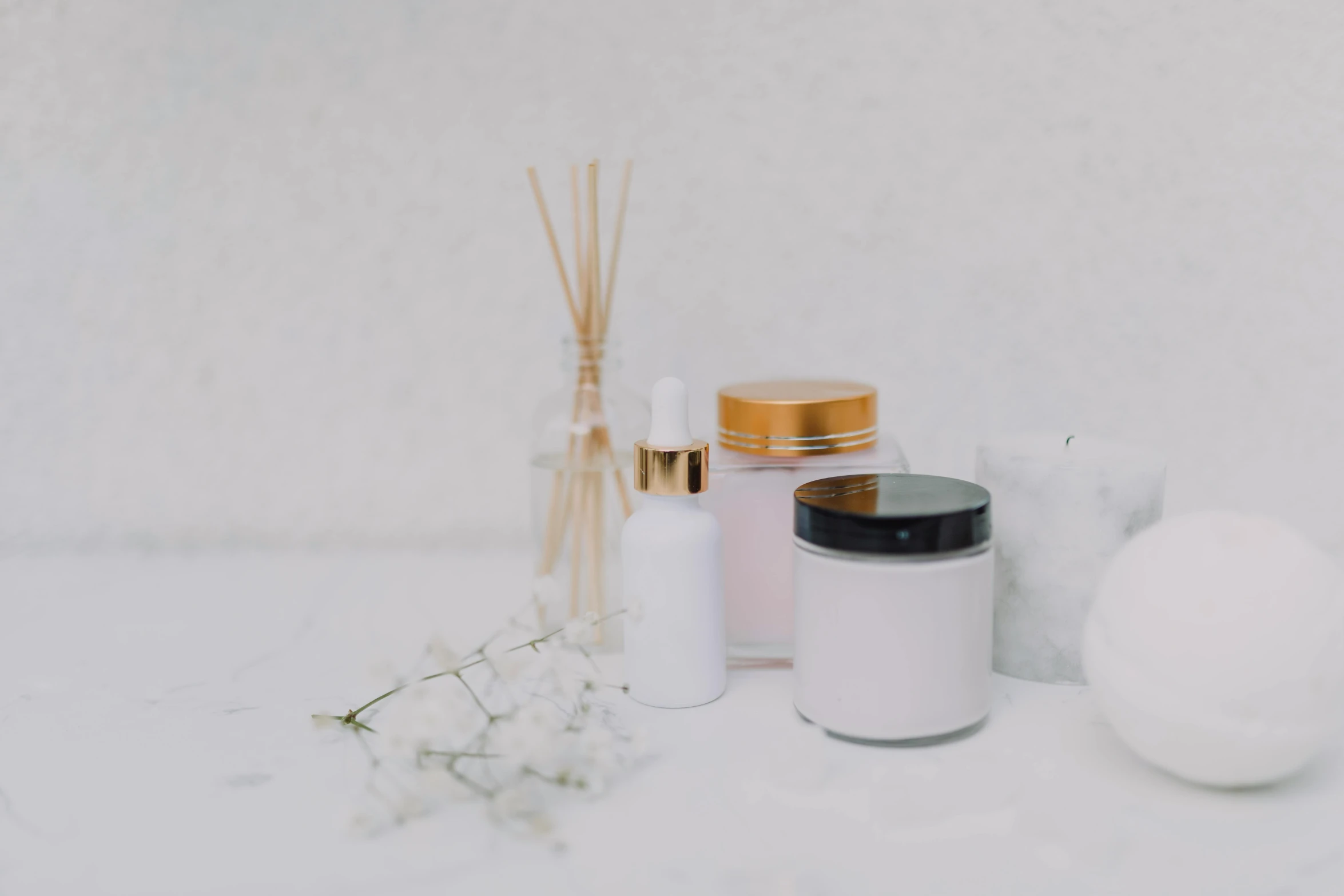 a bunch of items that are sitting on a table, beauty, in a white room, jar on a shelf, product image