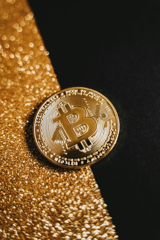 a bitcoin sitting on top of a gold tie, an album cover, by Julia Pishtar, trending on unsplash, renaissance, sparkly, thumbnail, product introduction photo, edible crypto