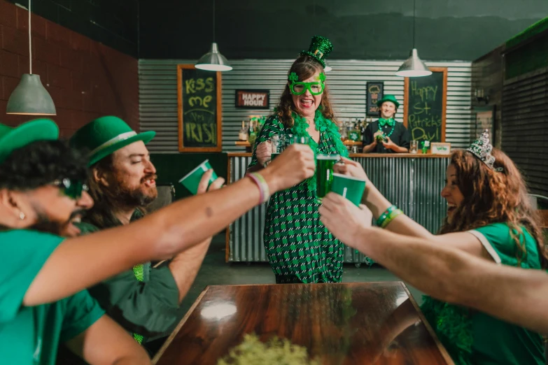 a group of people dressed in green celebrating st patrick's day, pexels contest winner, aussie baristas, beers on the table, she wears a dark green dress, twiddle a plopple