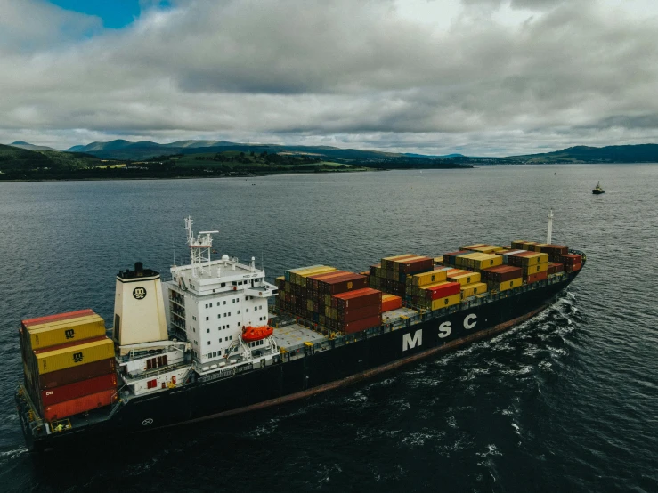 a large cargo ship in the middle of a body of water, a portrait, pexels contest winner, renaissance, miles johnstone, skye meaker, trading depots, straight camera view