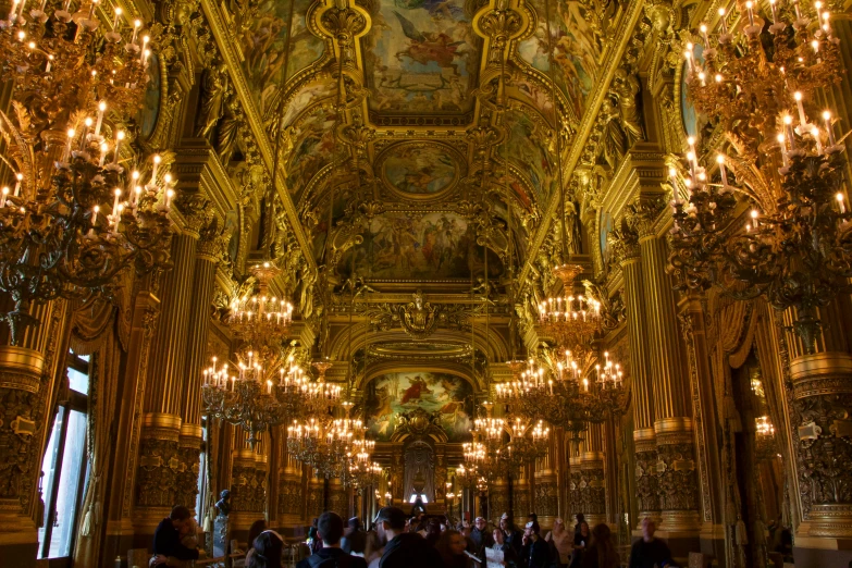 a large room filled with lots of chandeliers, by Róbert Berény, travel, square, touring, over-shoulder shot