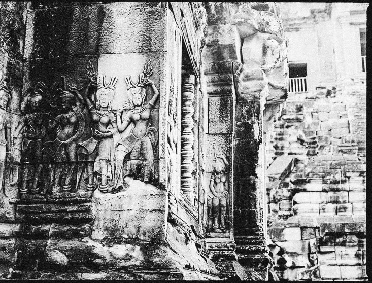 a black and white photo of an old building, an engraving, by Ke Jiusi, flickr, angkor thon, mural, shot on 16mm film, scene!!