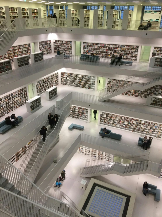 a large library filled with lots of books, an album cover, pexels contest winner, modernism, tiny people walking below, snapchat photo, the borg, daniel libeskind